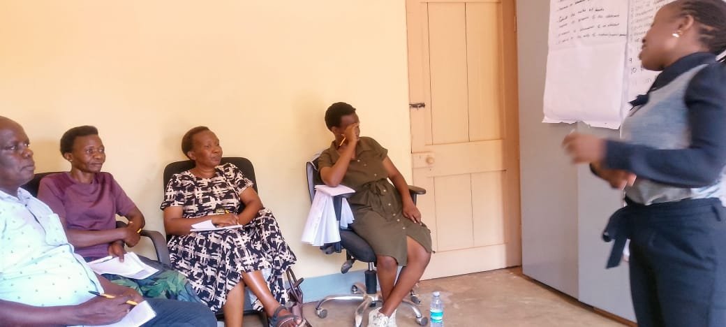 Attentive Ear volunteers being trained by strong minds Uganda